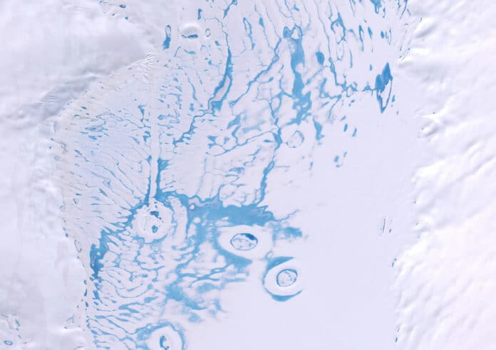 Pooled meltwater and slush on the Bach Ice Shelf. Contains modified Copernicus Sentinel data, processed by Rebecca Dell.